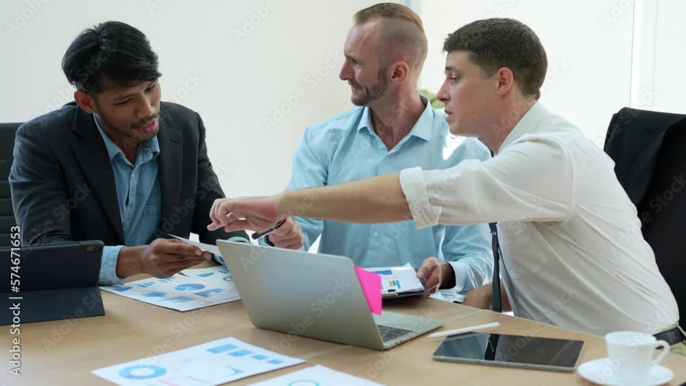 Team business adviser meeting to analyze and discuss the situation on the financial report n the meeting room Team business adviser meeting to analyze and discuss the situation on the financial report n the meeting room