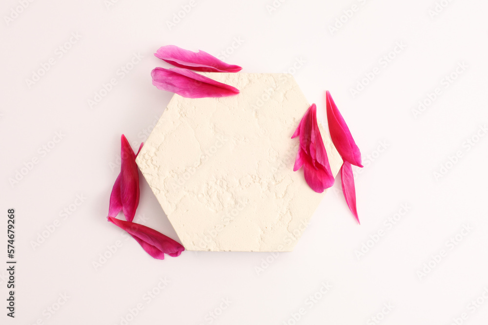 Purple pion flowert petal and stones platform podium on beige