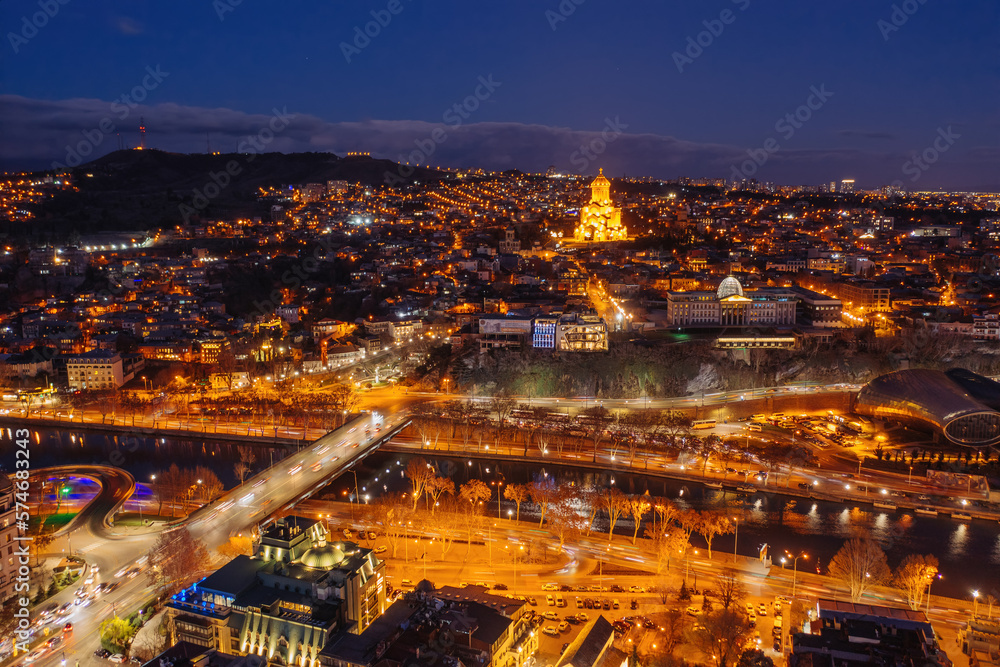 Panoramic night aerial view of Tbilisi, capital of Georgia from drone