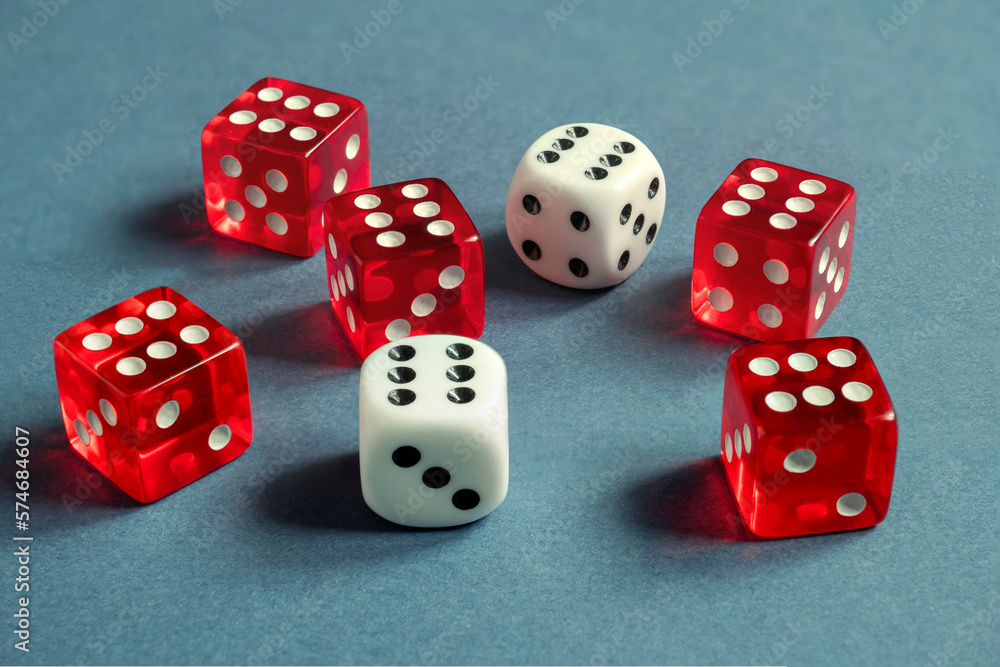 Random number generator. Red and white dice with numerical values lie in a chaotic order. Random number generator. Red and white dice with numerical values lie in a chaotic order.
