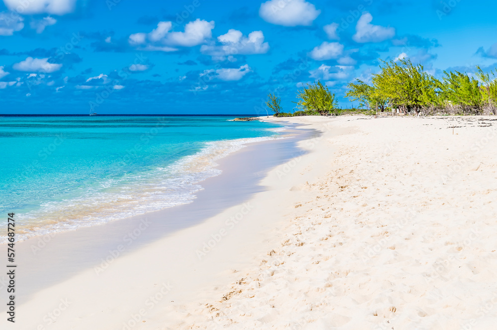 A view along an idyllic shoreline on the island of Grand Turk on a bright sunny morning A view along an idyllic shoreline on the island of Grand Turk on a bright sunny morning