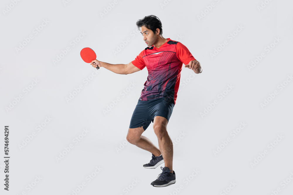 Portrait of sports man male athlete playing table tennis isolated. Portrait of sports man male athlete playing table tennis isolated.