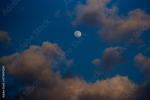 landscape early morning sky moon and clouds on a blue background