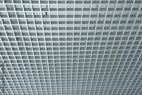 grid ceiling background is beautiful because it is designed to cover traces of original ceiling resulting in modern grid ceiling pattern. backdrop of ceiling is decorated with steel in grid pattern.