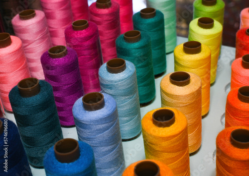 Rows of Multi-colored Thread Spools