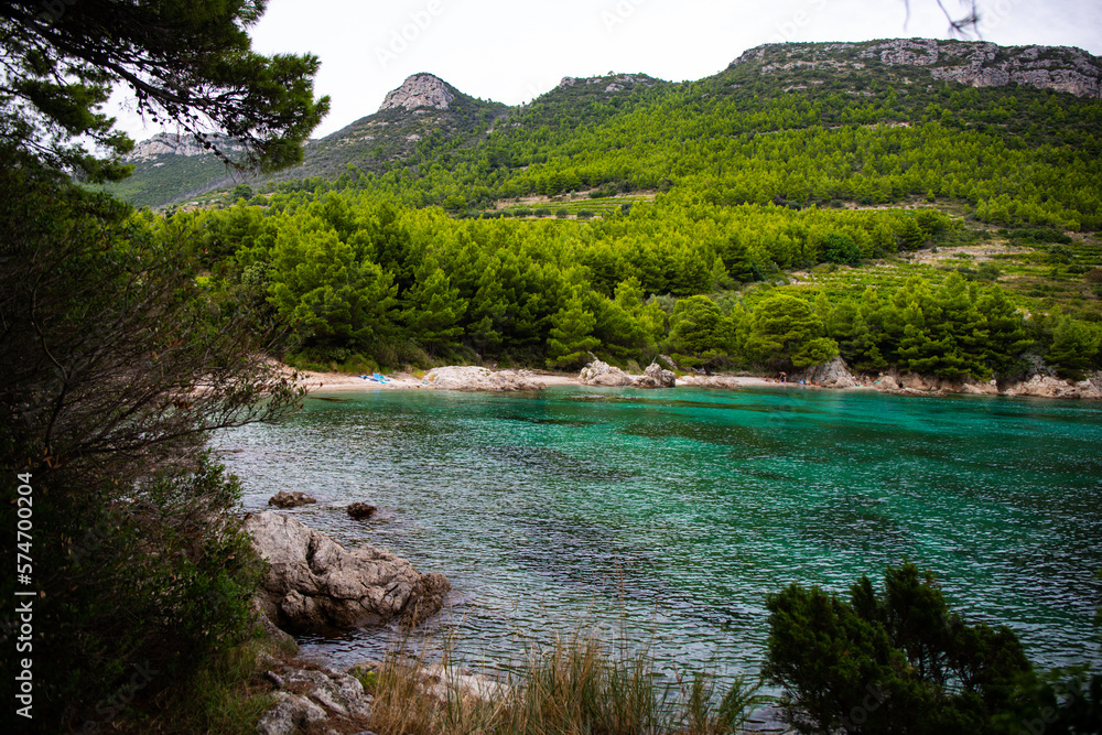 panorama of the peljesac peninsula coastline in croatia; an amazing Mediterranean coastline with rocks and green hills over turquoise water