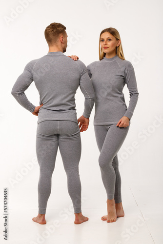 Sports family, husband and wife in thermal clothes.