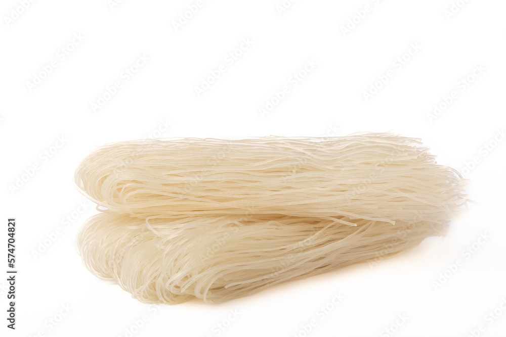 Dried raw rice noodles isolated on white background.