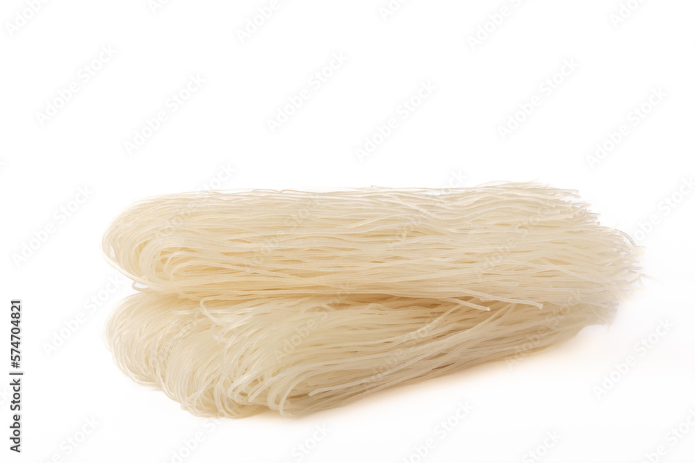Dried raw rice noodles isolated on white background. Dried raw rice noodles isolated on white background.