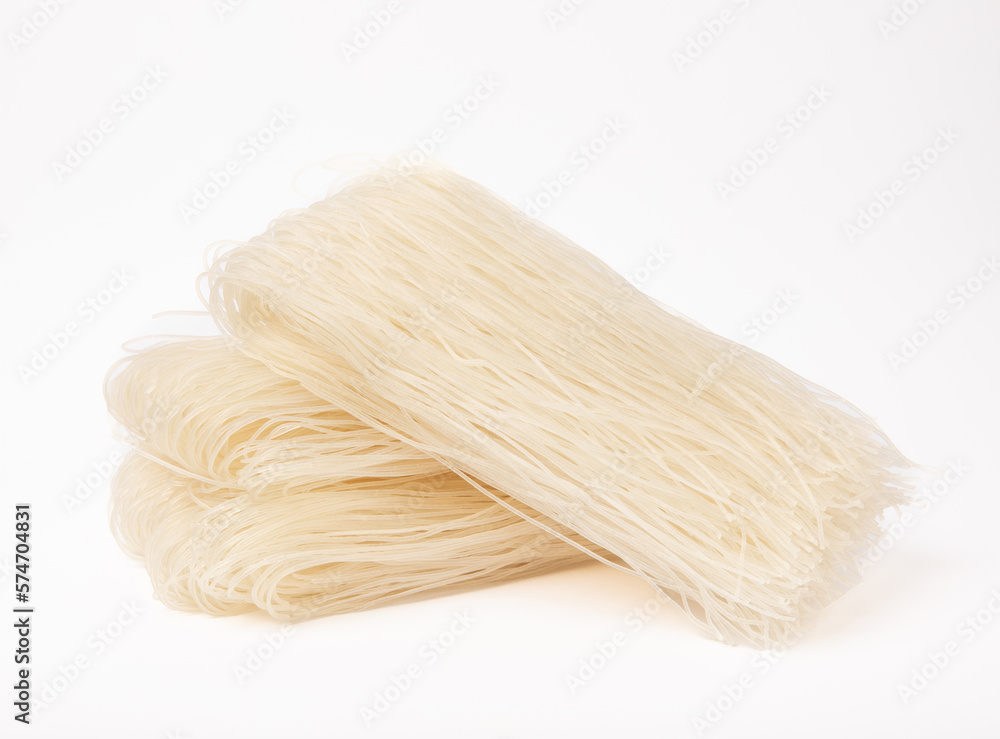 Dried raw rice noodles isolated on white background. Dried raw rice noodles isolated on white background.