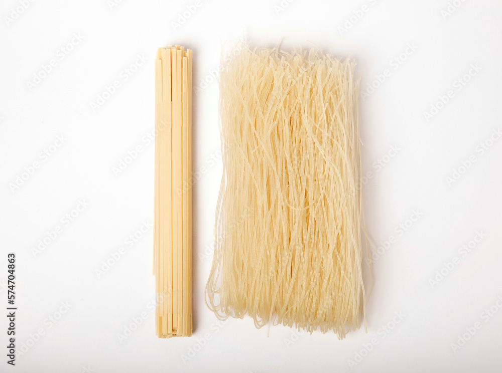 Dried raw rice noodles isolated on white background. Dried raw rice noodles isolated on white background.