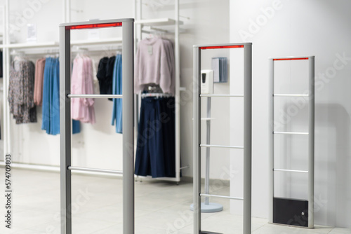 Close up anti-theft system in a clothing store. Entrance gate with scanner to prevent theft
