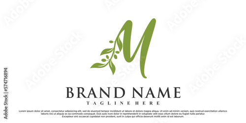 M latter logo design with nature beauty Premium Vector
