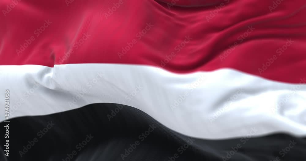 Close-up view of the Yemen national flag waving Close-up view of the Yemen national flag waving