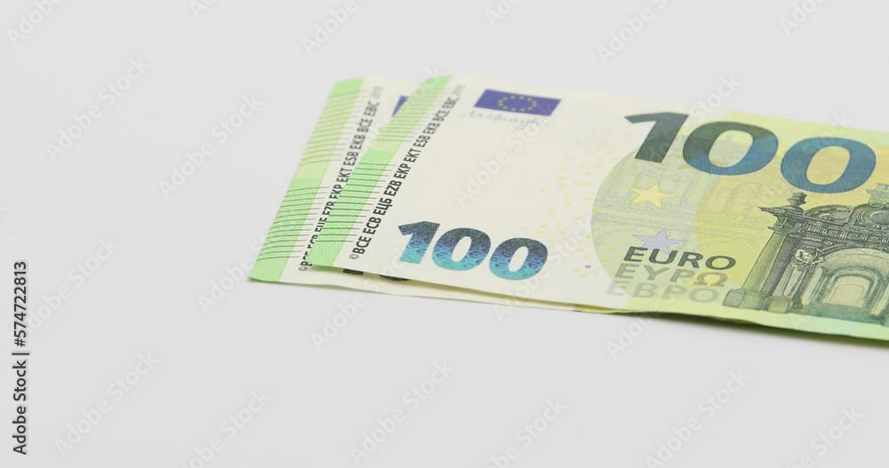 Putting on the white table banknotes of 100 euros. White background Putting on the white table banknotes of 100 euros. White background