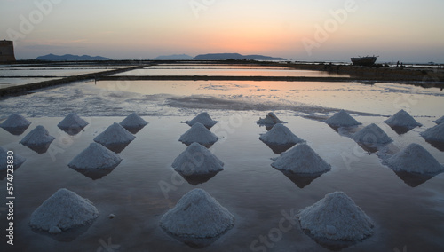 The Saline di Trapani and Paceco oriented nature reserve is a protected natural area in Sicily where the ancient sea salt extraction activity takes place.
