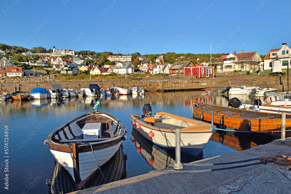 small boats moored in the harbor in a small   swedish seaside town Molle