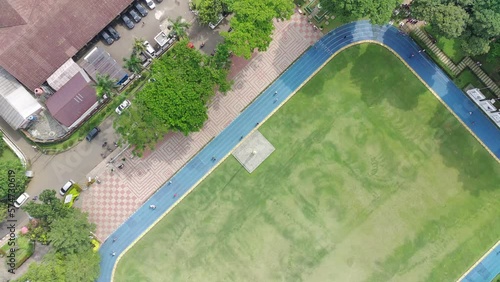 4K footage aerial view of Sempur field park which many people use for exercise. photo