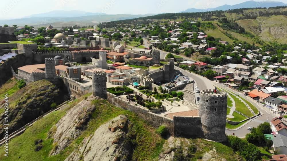 Aerial panning view Akhaltsikhe Castle on Akhaltsikhe town in Georgia in summer day Aerial panning view Akhaltsikhe Castle on Akhaltsikhe town in Georgia in summer day