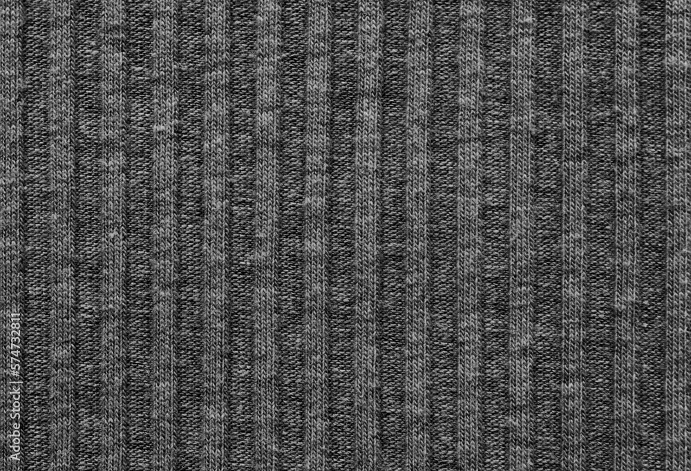 Soft dark gray color ribbed knit fabric pattern close up as background
Soft dark gray color ribbed knit fabric pattern close up as background
