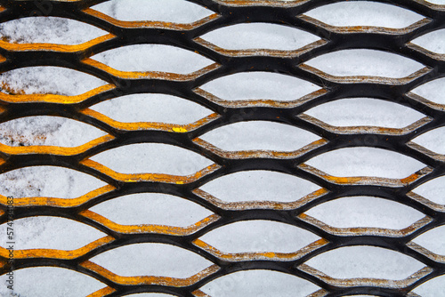 expanded metal sheet rusty on white background