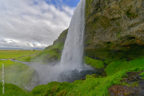 Seljalandsfoss waterfall with the rainbow © mylasa
