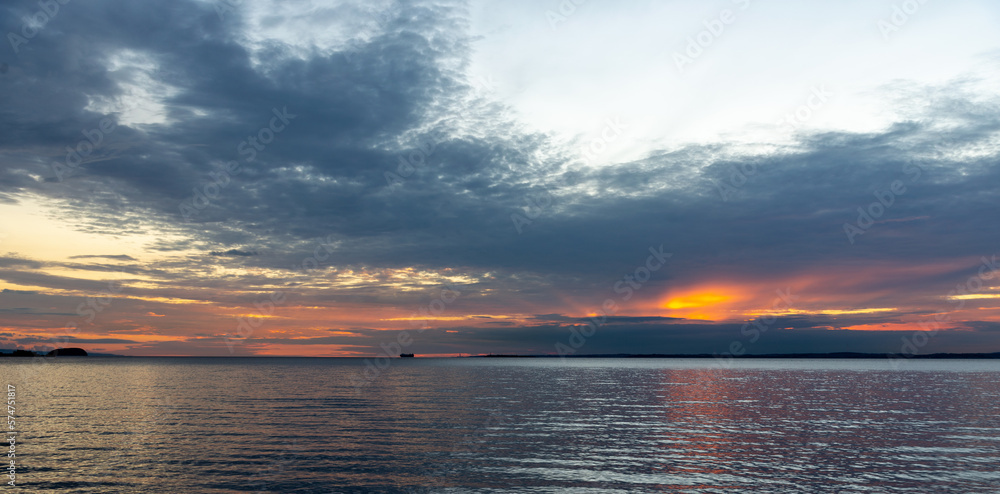 View sunset on sea side in England. View sunset on sea side in England.