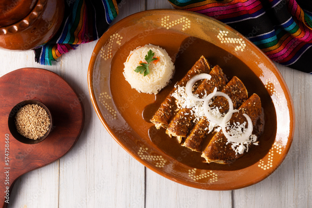 Chicken enmoladas. Also known as mole poblano enchiladas, they are a