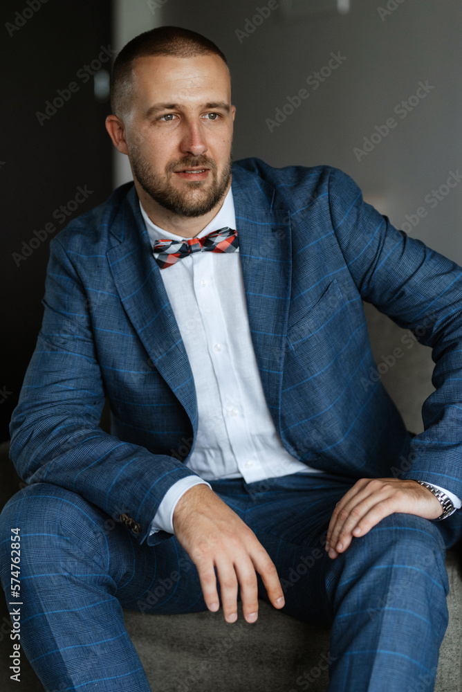 portrait of smiling groom with beard portrait of smiling groom with beard