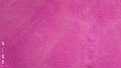 panoramic textile background - crushed silk fabric colored in purple with tie-dye stains at home