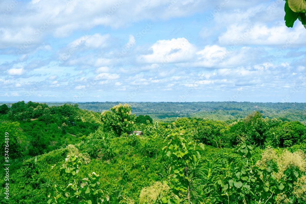 Naklejka premium Beautiful landscape with cloudy Sky in Chimbuk Hill at Bandarban Bangladesh. Beautiful Natural Image . Aerial view of a beautiful mountain landscape with low clouds, Bandarban, Bangladesh.
