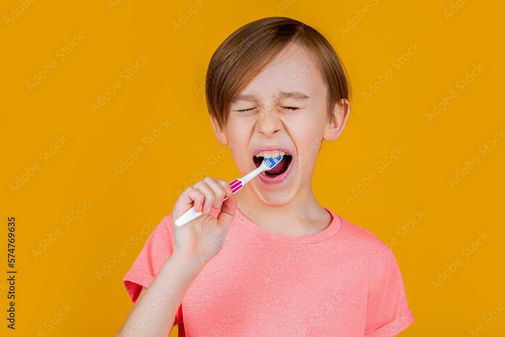 Health care, dental hygiene. Little boy cleaning teeth with kids toothbrush. Dental hygiene. Little man brushing teeth. Happy child kid boy with toothbrush Health care, dental hygiene. Little boy cleaning teeth with kids toothbrush. Dental hygiene. Little man brushing teeth. Happy child kid boy with toothbrush
