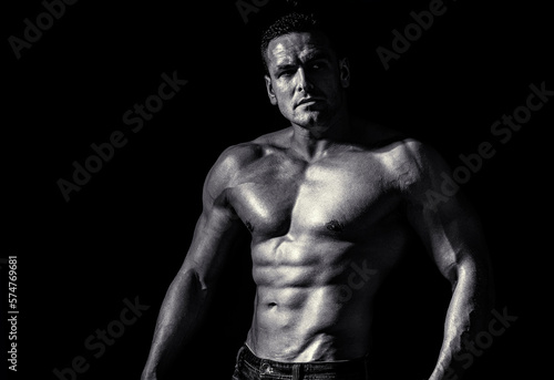 Muscular sexy man. Handsome sexual strong man with muscular body. Black and white
