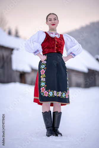 Young beautiful slovak woman in traditional costume. Slovak folklore