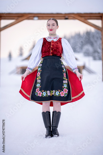 Young beautiful slovak woman in traditional costume. Slovak folklore