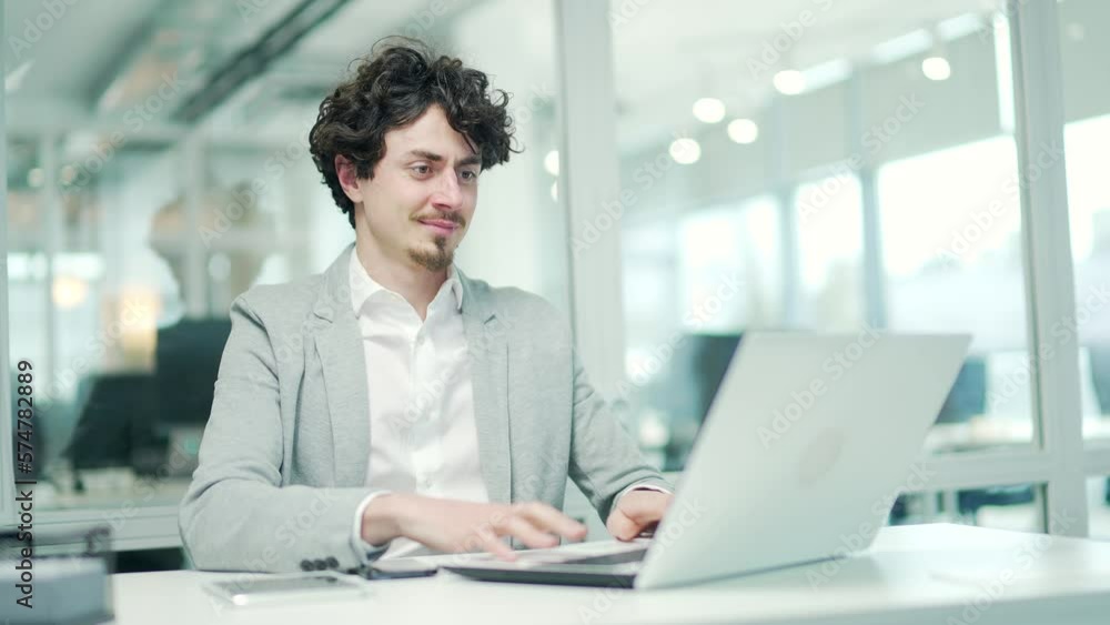 Smiling curly entrepreneur freelancer with hands behind head feels satisfied with work well done Calm bearded businessman relax after hard working day finished project on computer at modern workplace Smiling curly entrepreneur freelancer with hands behind head feels satisfied with work well done Calm bearded businessman relax after hard working day finished project on computer at modern workplace