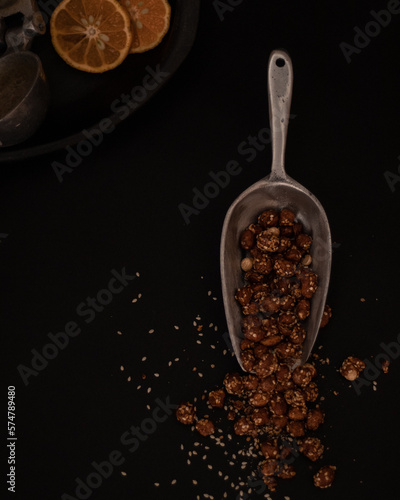 sugar nuts in a spoon