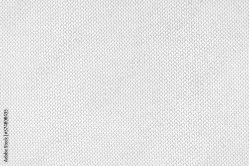Texture background of velours white fabric. Fabric texture of upholstery furniture textile material, design interior, wall decor. Fabric texture close up, backdrop, wallpaper.