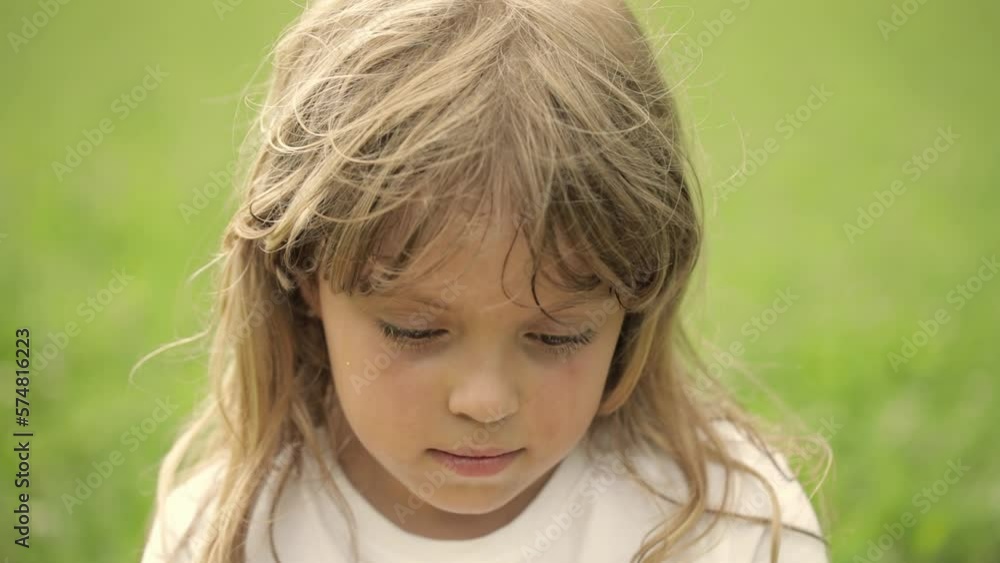 Closeup of a caucasian girl in the field. Closeup of a caucasian girl in the field.