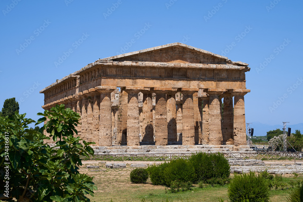 View on the Poseidon Temple from the Unesco World Heritage Site in Paestum. The facility is located in the Campania region of Italy. Ancient Greek culture in southern Italy.