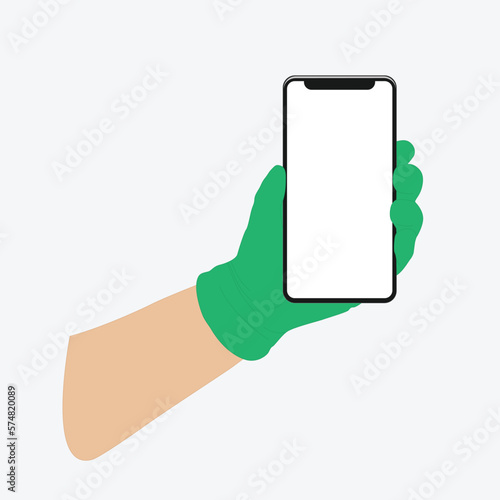 Mobile phone in a man's hand, hand in a medical, rubber glove.