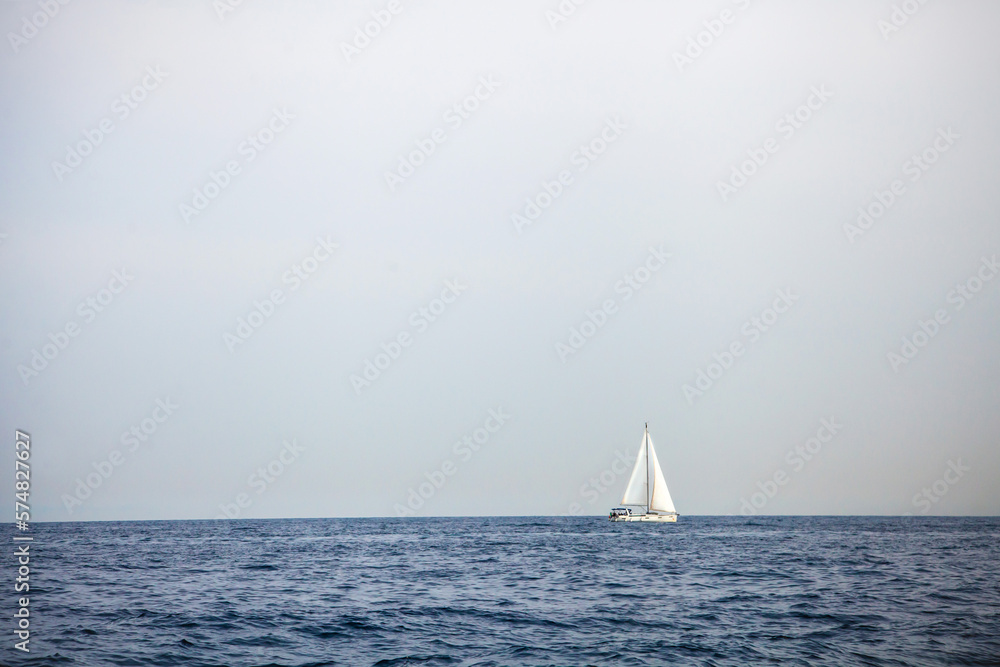 View of a Sailboat on the Tyrrhenian Sea on the coast of Ischia, Italy