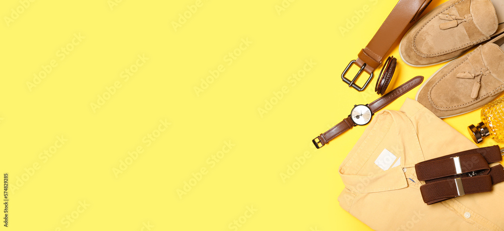 Stylish man's look with suspenders on yellow background with space for text Stylish man's look with suspenders on yellow background with space for text