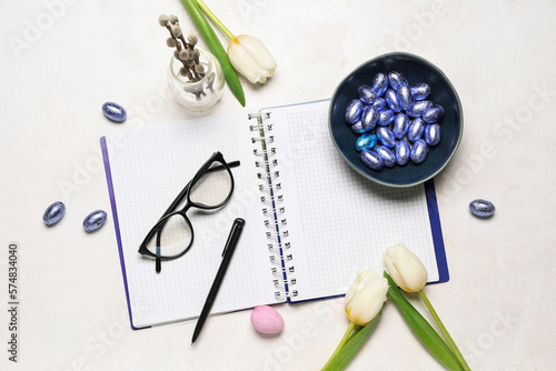 Wallpaper Mural Notebook with eyeglasses, Easter eggs and tulips on white background Torontodigital.ca