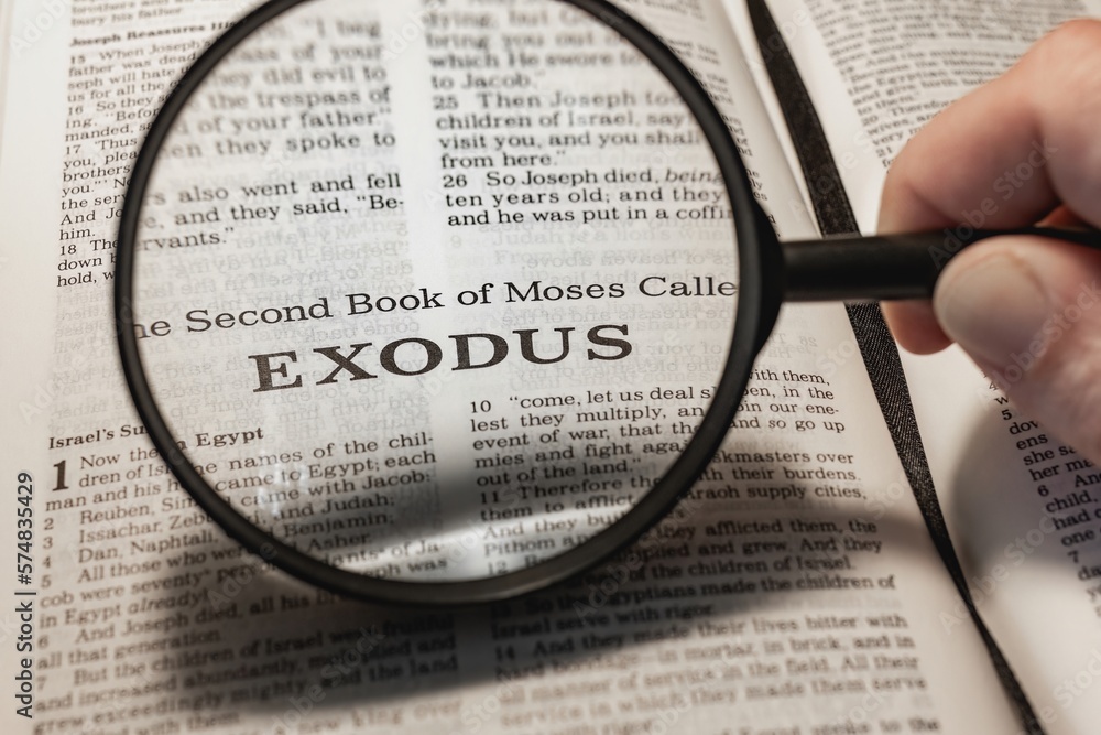 title page book of Exodus close up using magnifying glass in the bible or Torah for faith, christian, hebrew, israelite, history, religion, christianity, Old Testament title page book of Exodus close up using magnifying glass in the bible or Torah for faith, christian, hebrew, israelite, history, religion, christianity, Old Testament