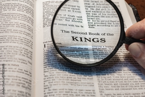 title page book of second kings close up using magnifying glass in the bible or Torah for faith  christian  hebrew  israelite  history  religion  christianity  Old Testament