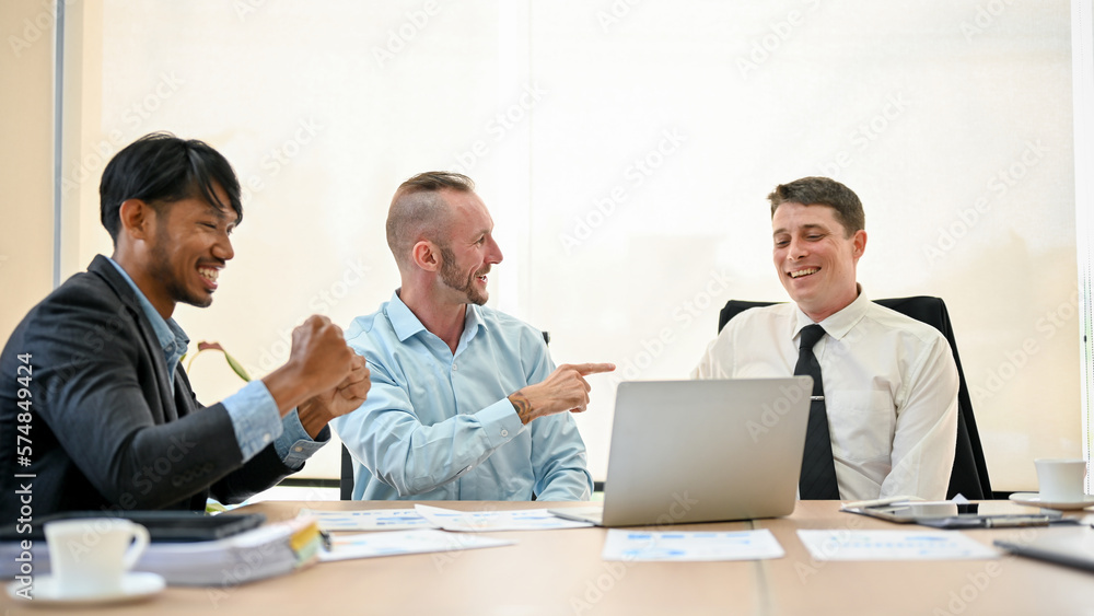 Financial team is in the meeting, feeling pleased with their business's current financial situation Financial team is in the meeting, feeling pleased with their business's current financial situation