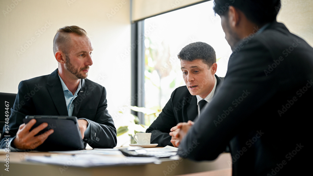 Professional business team working together, a diverse office people group discussing Professional business team working together, a diverse office people group discussing