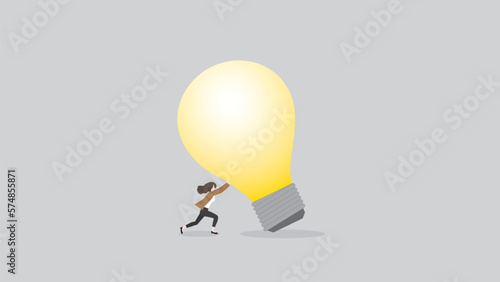 Business idea, creativity, innovation, creation, inspiration, imagination, and thinking concept. A businesswoman pushes the big light bulb. the business solution, problem-solving from work problem.