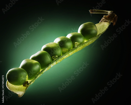 Pea pod on green background